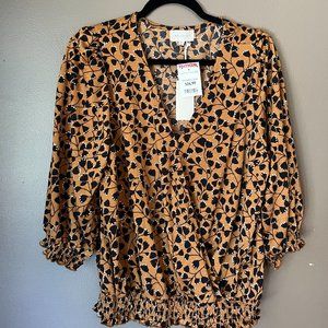 Mustard with black floral pattern wrap blouse NWT